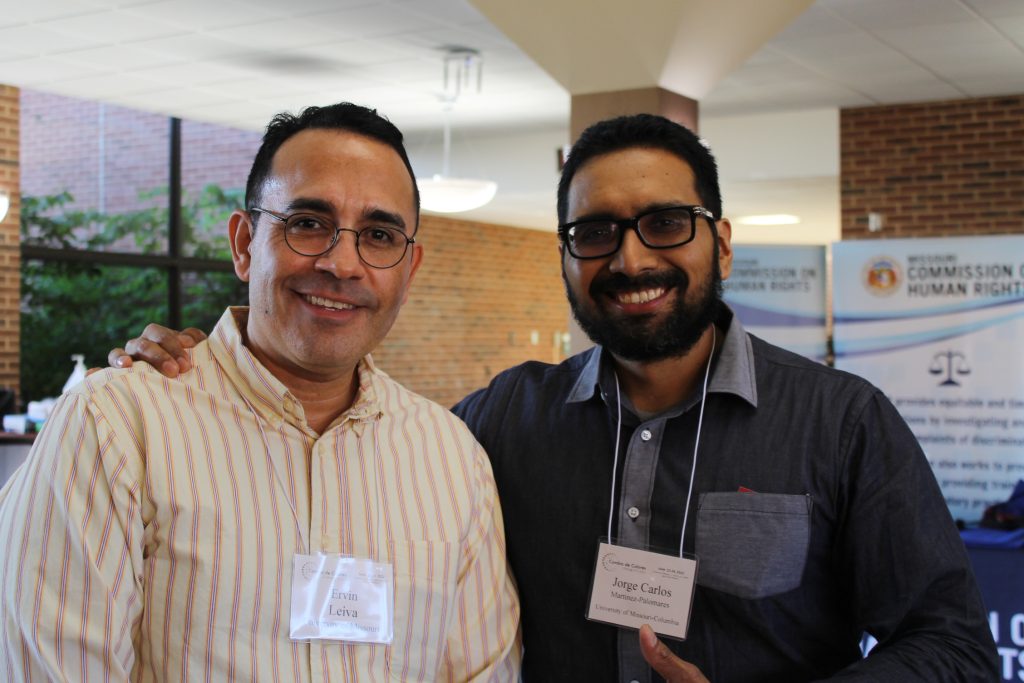 Image of two Cambio fellows next to each other and wearing name tags. Their names can be seen, "Ervin Leiva" and "Jorge Carlos Martínez"